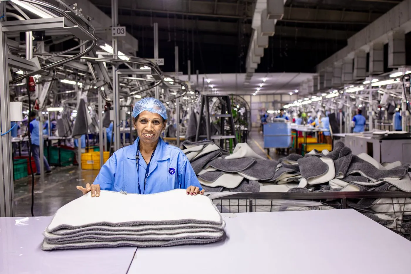 A worker on a manufacturing floor