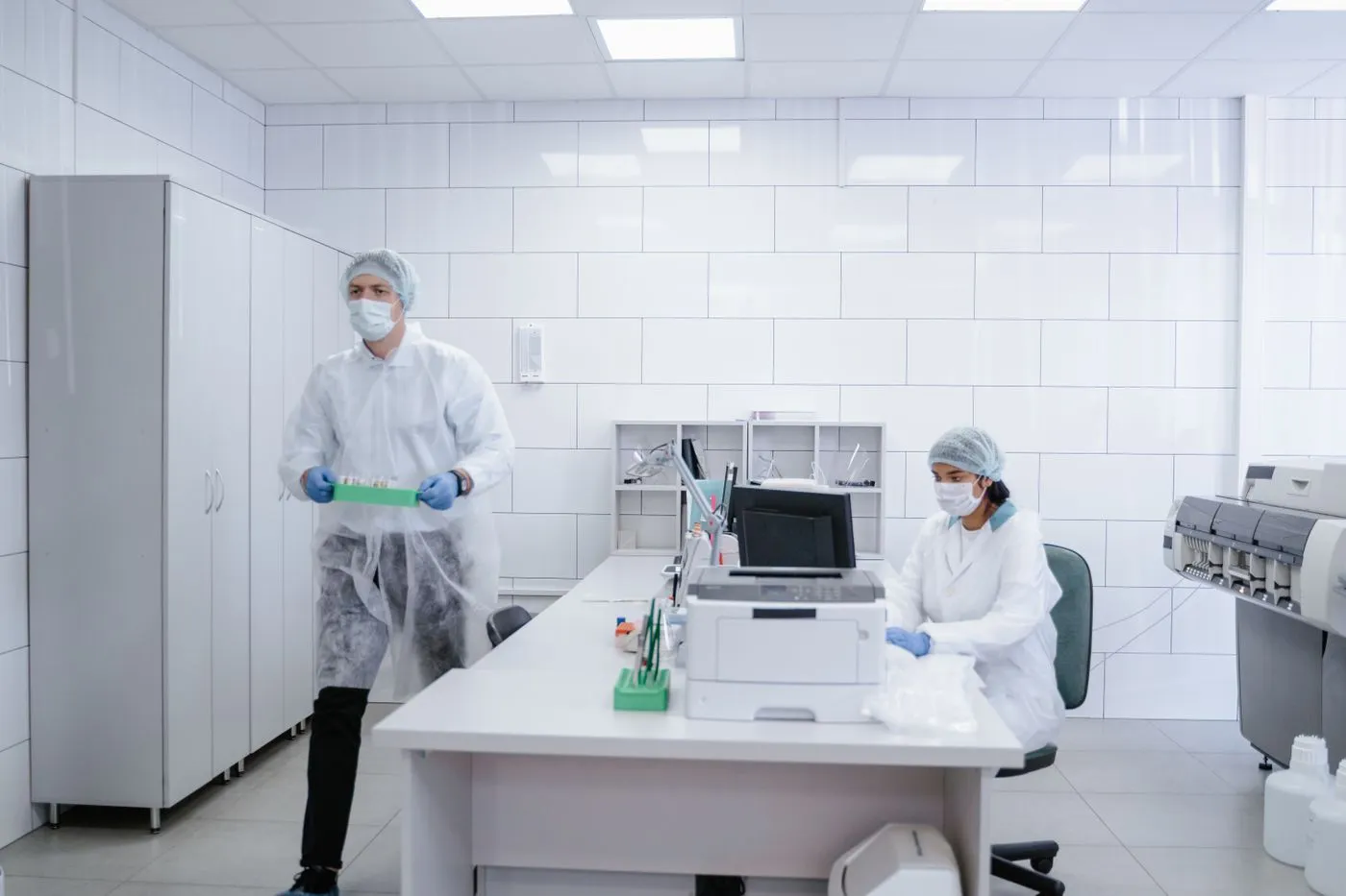 Technicians in a clean-room laboratory